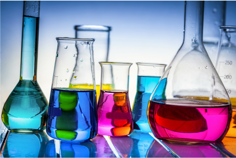 Colorful chemicals in laboratory flasks